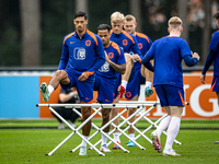 Netherlands player Tijjani Reijnders and Netherlands player Justin Kluivert during the training and press conference for the Netherlands Nat...