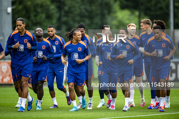 Netherlands players Virgil van Dijk, Brian Brobbey, Nathan Ake, Justin Kluivert, and Jurrien Timber during the training and press conference...