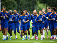 Netherlands players Virgil van Dijk, Brian Brobbey, Nathan Ake, Justin Kluivert, and Jurrien Timber during the training and press conference...