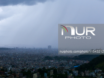 Rain lashes part of Kathmandu Valley in Nepal on September 3, 2024, as the monsoon rain continues. (