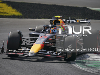 Sergio Perez of Mexico drives the (11) Oracle Red Bull Racing RB20 Honda RBPT during the race of the Formula 1 Pirelli Gran Premio d'Italia...