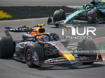 Sergio Perez of Mexico drives the (11) Oracle Red Bull Racing RB20 Honda RBPT during the race of the Formula 1 Pirelli Gran Premio d'Italia...