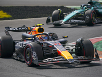 Sergio Perez of Mexico drives the (11) Oracle Red Bull Racing RB20 Honda RBPT during the race of the Formula 1 Pirelli Gran Premio d'Italia...