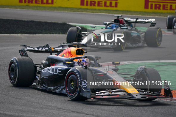 Max Verstappen of the Netherlands drives the Oracle Red Bull Racing RB20 Honda RBPT during the race of the Formula 1 Pirelli Gran Premio d'I...