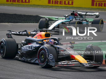 Max Verstappen of the Netherlands drives the Oracle Red Bull Racing RB20 Honda RBPT during the race of the Formula 1 Pirelli Gran Premio d'I...