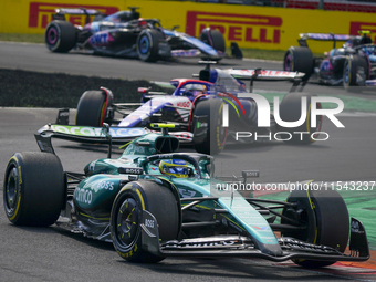 Fernando Alonso of Spain drives the (14) Aston Martin Aramco Cognizant F1 Team AMR24 Mercedes during the race of the Formula 1 Pirelli Gran...