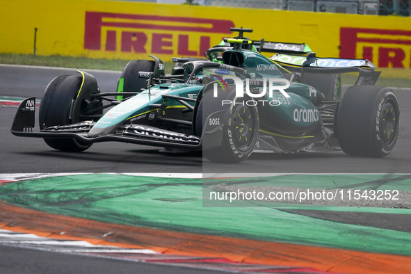 Fernando Alonso of Spain drives the (14) Aston Martin Aramco Cognizant F1 Team AMR24 Mercedes during the race of the Formula 1 Pirelli Gran...