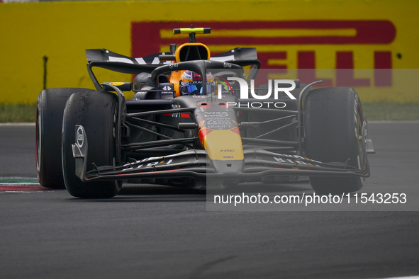 Sergio Perez of Mexico drives the (11) Oracle Red Bull Racing RB20 Honda RBPT during the race of the Formula 1 Pirelli Gran Premio d'Italia...