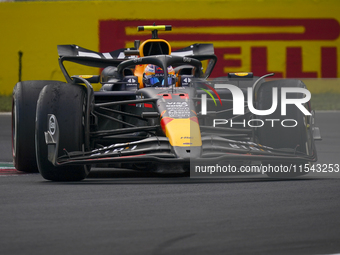 Sergio Perez of Mexico drives the (11) Oracle Red Bull Racing RB20 Honda RBPT during the race of the Formula 1 Pirelli Gran Premio d'Italia...