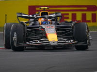 Sergio Perez of Mexico drives the (11) Oracle Red Bull Racing RB20 Honda RBPT during the race of the Formula 1 Pirelli Gran Premio d'Italia...