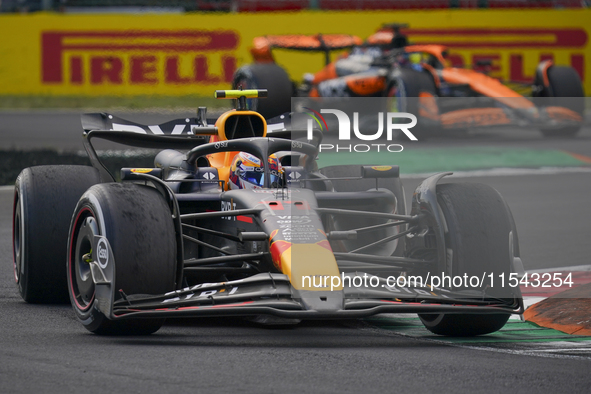 Sergio Perez of Mexico drives the (11) Oracle Red Bull Racing RB20 Honda RBPT during the race of the Formula 1 Pirelli Gran Premio d'Italia...