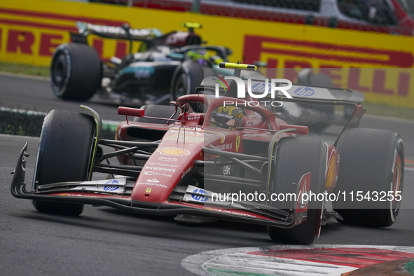 Carlos Sainz Jr. of Spain drives the (55) Scuderia Ferrari SF-24 Ferrari during the race of the Formula 1 Pirelli Gran Premio d'Italia 2024...