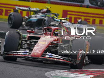 Carlos Sainz Jr. of Spain drives the (55) Scuderia Ferrari SF-24 Ferrari during the race of the Formula 1 Pirelli Gran Premio d'Italia 2024...