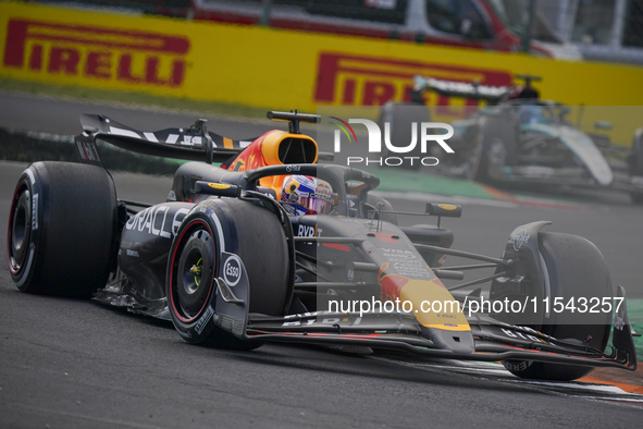 Max Verstappen of the Netherlands drives the Oracle Red Bull Racing RB20 Honda RBPT during the race of the Formula 1 Pirelli Gran Premio d'I...