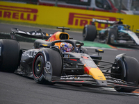 Max Verstappen of the Netherlands drives the Oracle Red Bull Racing RB20 Honda RBPT during the race of the Formula 1 Pirelli Gran Premio d'I...