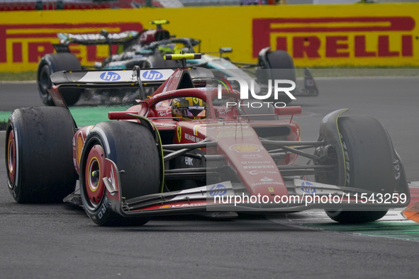 Carlos Sainz Jr. of Spain drives the (55) Scuderia Ferrari SF-24 Ferrari during the race of the Formula 1 Pirelli Gran Premio d'Italia 2024...