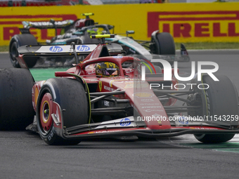 Carlos Sainz Jr. of Spain drives the (55) Scuderia Ferrari SF-24 Ferrari during the race of the Formula 1 Pirelli Gran Premio d'Italia 2024...