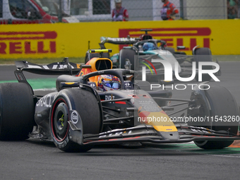 Sergio Perez of Mexico drives the (11) Oracle Red Bull Racing RB20 Honda RBPT during the race of the Formula 1 Pirelli Gran Premio d'Italia...