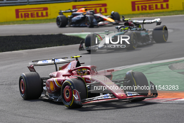 Carlos Sainz Jr. of Spain drives the (55) Scuderia Ferrari SF-24 Ferrari during the race of the Formula 1 Pirelli Gran Premio d'Italia 2024...