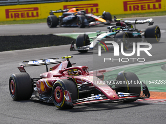 Carlos Sainz Jr. of Spain drives the (55) Scuderia Ferrari SF-24 Ferrari during the race of the Formula 1 Pirelli Gran Premio d'Italia 2024...