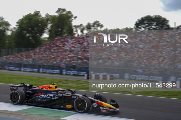 Sergio Perez of Mexico drives the (11) Oracle Red Bull Racing RB20 Honda RBPT during the race of the Formula 1 Pirelli Gran Premio d'Italia...