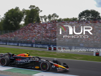 Sergio Perez of Mexico drives the (11) Oracle Red Bull Racing RB20 Honda RBPT during the race of the Formula 1 Pirelli Gran Premio d'Italia...