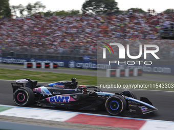 Esteban Ocon of France drives the (31) BWT Alpine F1 Team A524 Renault during the race of the Formula 1 Pirelli Gran Premio d'Italia 2024 in...