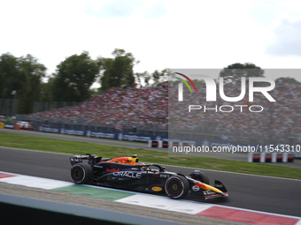 Sergio Perez of Mexico drives the (11) Oracle Red Bull Racing RB20 Honda RBPT during the race of the Formula 1 Pirelli Gran Premio d'Italia...