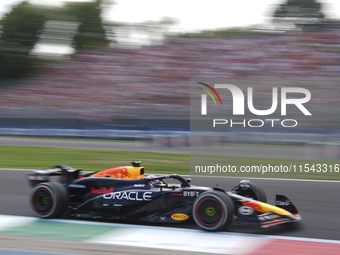 Max Verstappen of the Netherlands drives the Oracle Red Bull Racing RB20 Honda RBPT during the race of the Formula 1 Pirelli Gran Premio d'I...