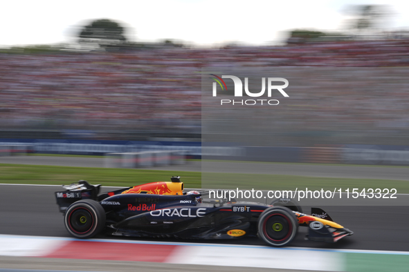 Max Verstappen of the Netherlands drives the Oracle Red Bull Racing RB20 Honda RBPT during the race of the Formula 1 Pirelli Gran Premio d'I...