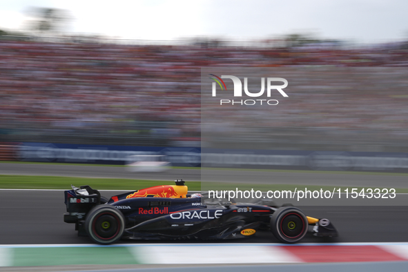 Max Verstappen of the Netherlands drives the Oracle Red Bull Racing RB20 Honda RBPT during the race of the Formula 1 Pirelli Gran Premio d'I...