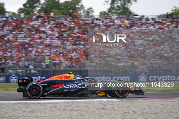 Sergio Perez of Mexico drives the (11) Oracle Red Bull Racing RB20 Honda RBPT during the race of the Formula 1 Pirelli Gran Premio d'Italia...