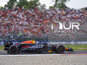 Sergio Perez of Mexico drives the (11) Oracle Red Bull Racing RB20 Honda RBPT during the race of the Formula 1 Pirelli Gran Premio d'Italia...