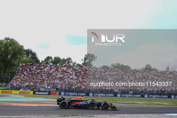 Sergio Perez of Mexico drives the (11) Oracle Red Bull Racing RB20 Honda RBPT during the race of the Formula 1 Pirelli Gran Premio d'Italia...