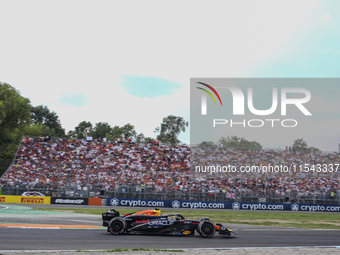 Sergio Perez of Mexico drives the (11) Oracle Red Bull Racing RB20 Honda RBPT during the race of the Formula 1 Pirelli Gran Premio d'Italia...