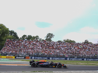 Sergio Perez of Mexico drives the (11) Oracle Red Bull Racing RB20 Honda RBPT during the race of the Formula 1 Pirelli Gran Premio d'Italia...