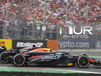 Sergio Perez of Mexico drives the (11) Oracle Red Bull Racing RB20 Honda RBPT during the race of the Formula 1 Pirelli Gran Premio d'Italia...