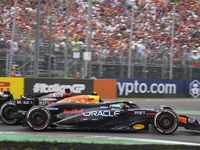 Sergio Perez of Mexico drives the (11) Oracle Red Bull Racing RB20 Honda RBPT during the race of the Formula 1 Pirelli Gran Premio d'Italia...