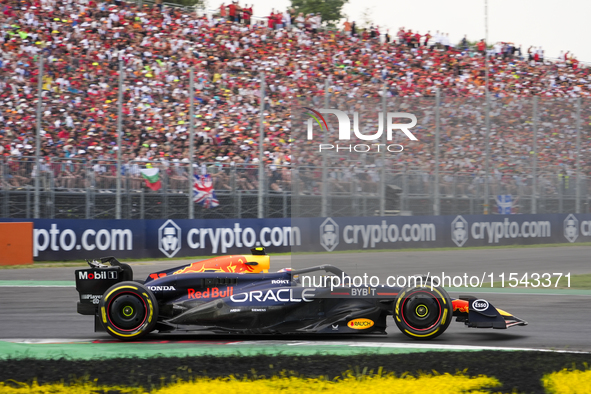 Sergio Perez of Mexico drives the (11) Oracle Red Bull Racing RB20 Honda RBPT during the race of the Formula 1 Pirelli Gran Premio d'Italia...