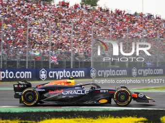 Sergio Perez of Mexico drives the (11) Oracle Red Bull Racing RB20 Honda RBPT during the race of the Formula 1 Pirelli Gran Premio d'Italia...