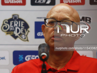 Lorenzo Bundy, manager of the Diablos Rojos of Mexico, speaks during a press conference to announce his pitching rotation to face Sultanes d...