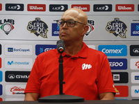 Lorenzo Bundy, manager of the Diablos Rojos of Mexico, speaks during a press conference to announce his pitching rotation to face Sultanes d...