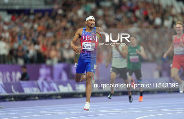 Jaydin Blackwell of United States of America celebrates winning gold in Men's 400m - T38 Final during the Paris 2024 Paralympic Games at Sta...