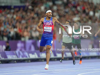 Jaydin Blackwell of United States of America celebrates winning gold in Men's 400m - T38 Final during the Paris 2024 Paralympic Games at Sta...