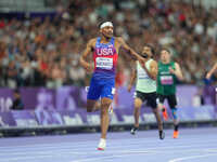 Jaydin Blackwell of United States of America celebrates winning gold in Men's 400m - T38 Final during the Paris 2024 Paralympic Games at Sta...