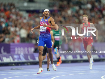 Jaydin Blackwell of United States of America celebrates winning gold in Men's 400m - T38 Final during the Paris 2024 Paralympic Games at Sta...