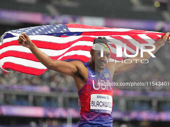 Jaydin Blackwell of United States of America celebrates winning gold in Men's 400m - T38 Final during the Paris 2024 Paralympic Games at Sta...