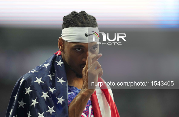 Jaydin Blackwell of United States of America celebrates winning gold in Men's 400m - T38 Final during the Paris 2024 Paralympic Games at Sta...