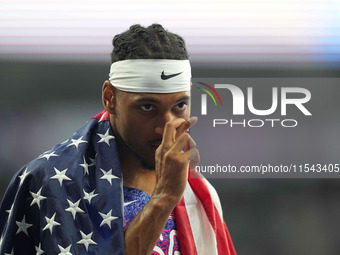 Jaydin Blackwell of United States of America celebrates winning gold in Men's 400m - T38 Final during the Paris 2024 Paralympic Games at Sta...