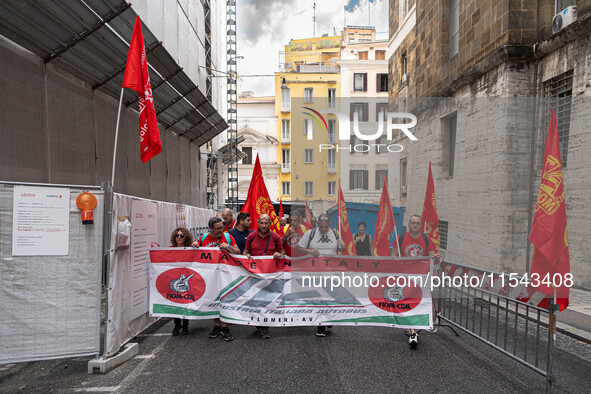 Italian bus industry workers rally in front of the Enterprises & Made in Italy Ministry to protest against the factory relocation from Bolog...